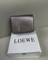 Loewe Anagram Trifold Wallet in - Silver Metallic Leather