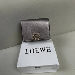 Loewe Anagram Trifold Wallet in - Silver Metallic Leather