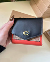 Coach Wyn Small Wallet in Color block Signature Canvas