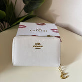 Coach Pebbled Leather Zip Around Wallet - white