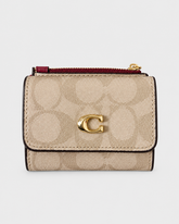 Coach Leather bi-fold wallet w/ two zippered pockets