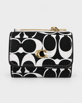Coach Wallet in black & white Signature Canvas