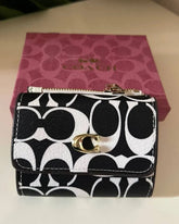 Coach Wallet in black & white Signature Canvas