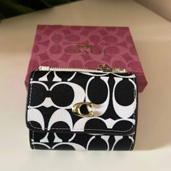 Coach Wallet in black & white Signature Canvas