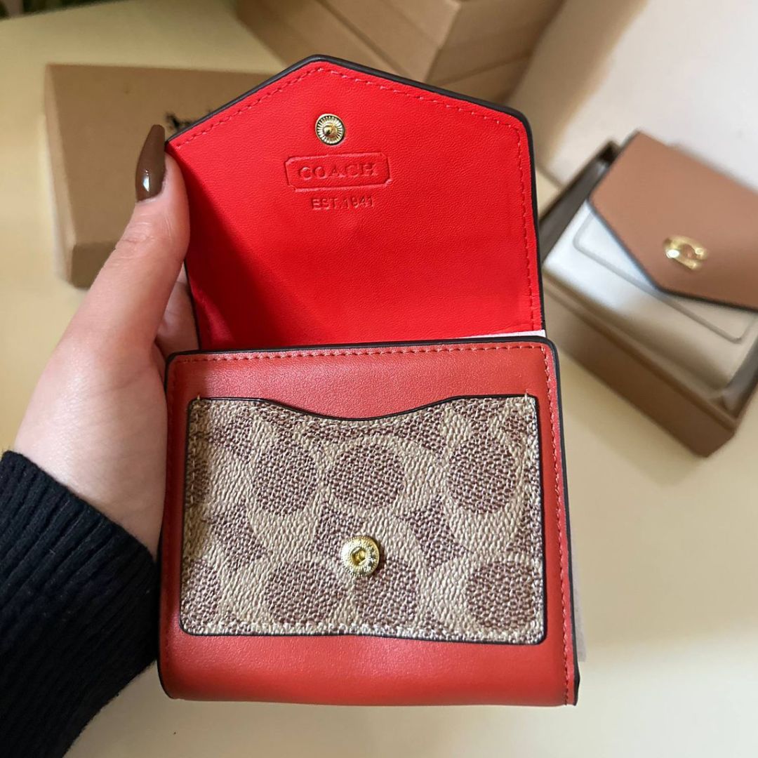 Coach Wyn Small Wallet in Color block Signature Canvas