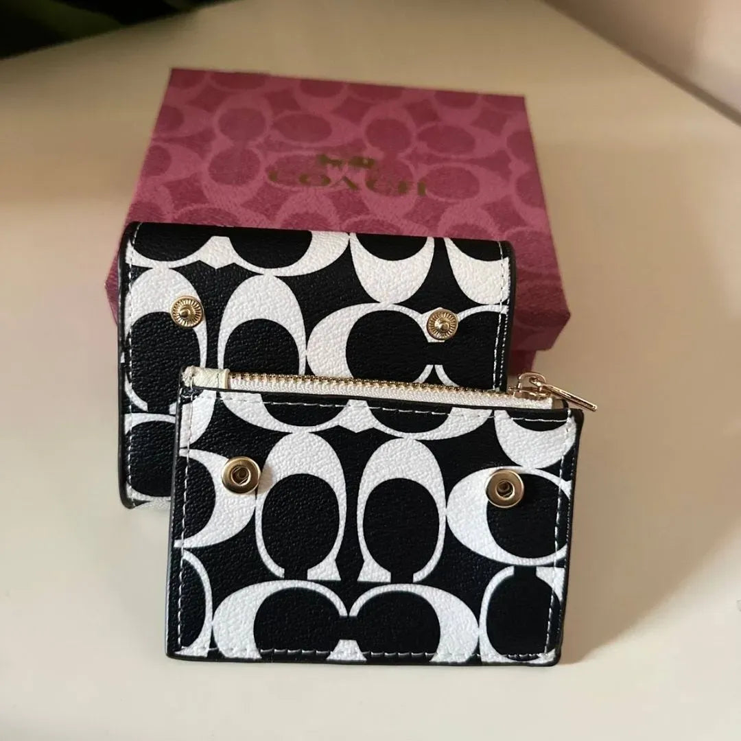 Coach Wallet in black & white Signature Canvas