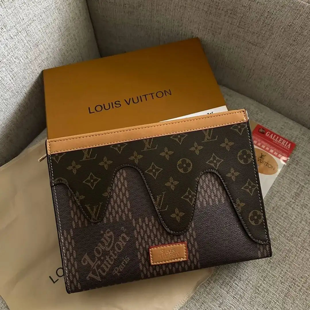 Louis Vuitton Embossed Leather Clutch Bag – Brown