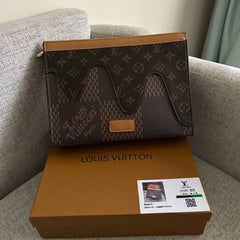 Louis Vuitton Embossed Leather Clutch Bag – Brown
